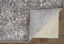 8' X 10' Taupe Gray And Orange Floral Power Loom Area Rug