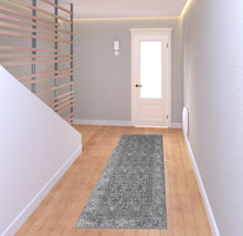 8' X 10' Taupe Gray And Orange Floral Power Loom Area Rug