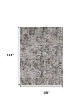 4' X 6' Ivory Gray And Brown Abstract Power Loom Distressed Stain Resistant Area Rug