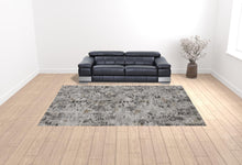 4' X 6' Ivory Gray And Brown Abstract Power Loom Distressed Stain Resistant Area Rug