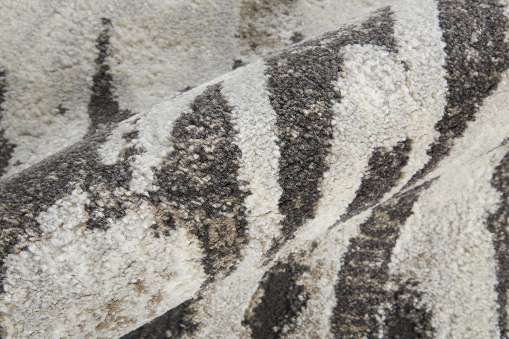 4' X 6' Ivory Brown And Gray Abstract Power Loom Stain Resistant Area Rug