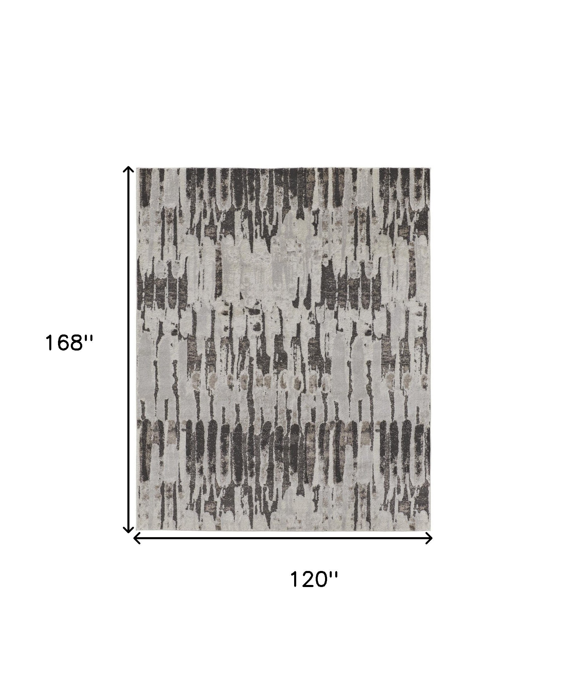 4' X 6' Ivory Brown And Gray Abstract Power Loom Stain Resistant Area Rug