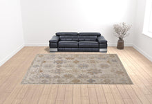 4' X 6' Ivory Tan And Blue Floral Hand Knotted Stain Resistant Area Rug