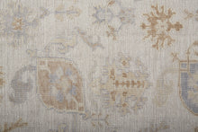 4' X 6' Ivory And Tan Floral Hand Knotted Stain Resistant Area Rug