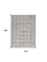 4' X 6' Ivory Silver And Tan Floral Hand Knotted Stain Resistant Area Rug