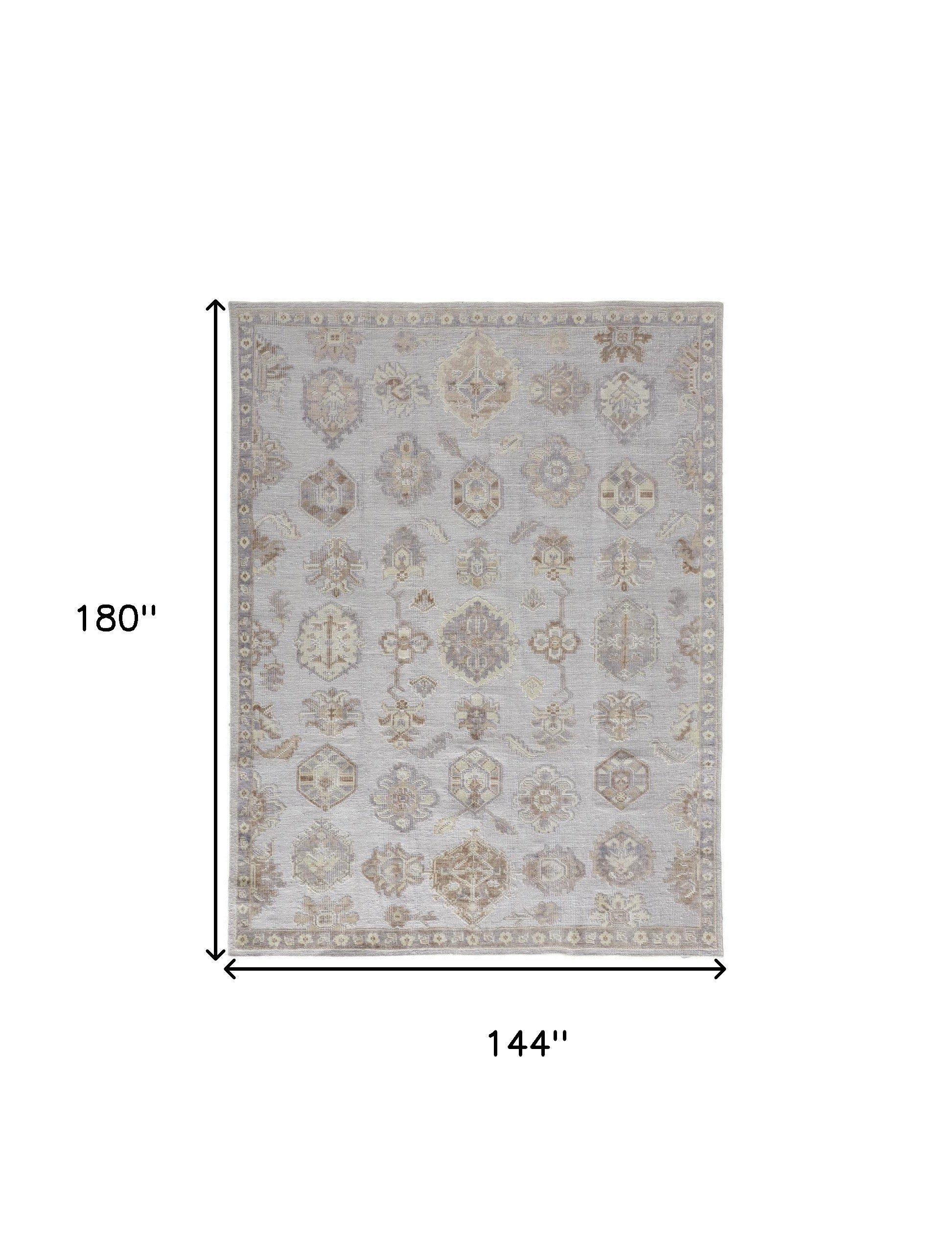 4' X 6' Ivory Silver And Tan Floral Hand Knotted Stain Resistant Area Rug