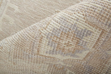 4' X 6' Tan And Brown Floral Hand Knotted Stain Resistant Area Rug