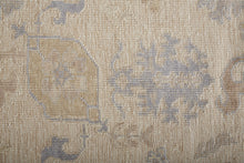 4' X 6' Tan Orange And Blue Floral Hand Knotted Stain Resistant Area Rug