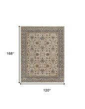 9' X 12' Tan Ivory And Gray Power Loom Area Rug