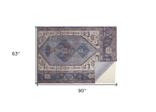 4' X 6' Blue Brown And Ivory Floral Area Rug