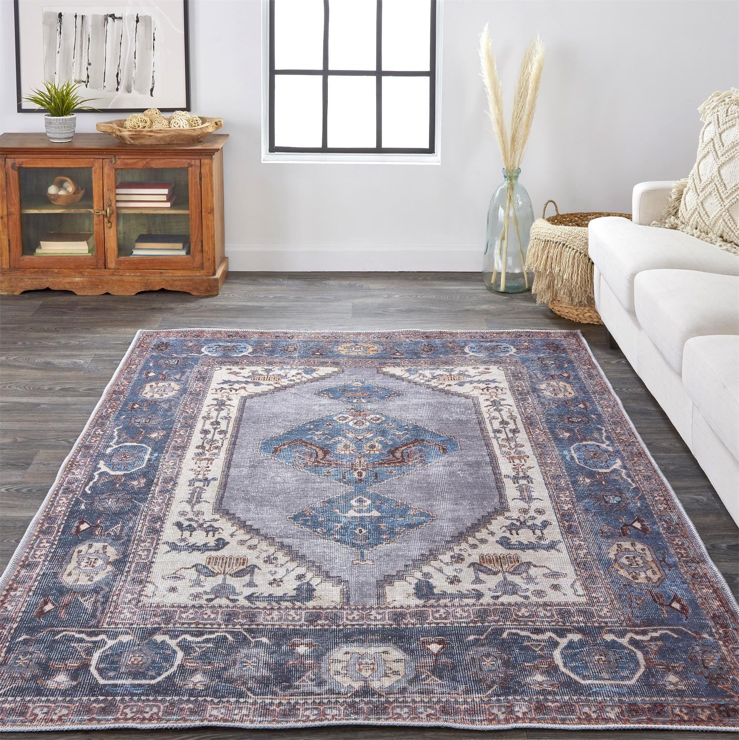 4' X 6' Blue Brown And Ivory Floral Area Rug