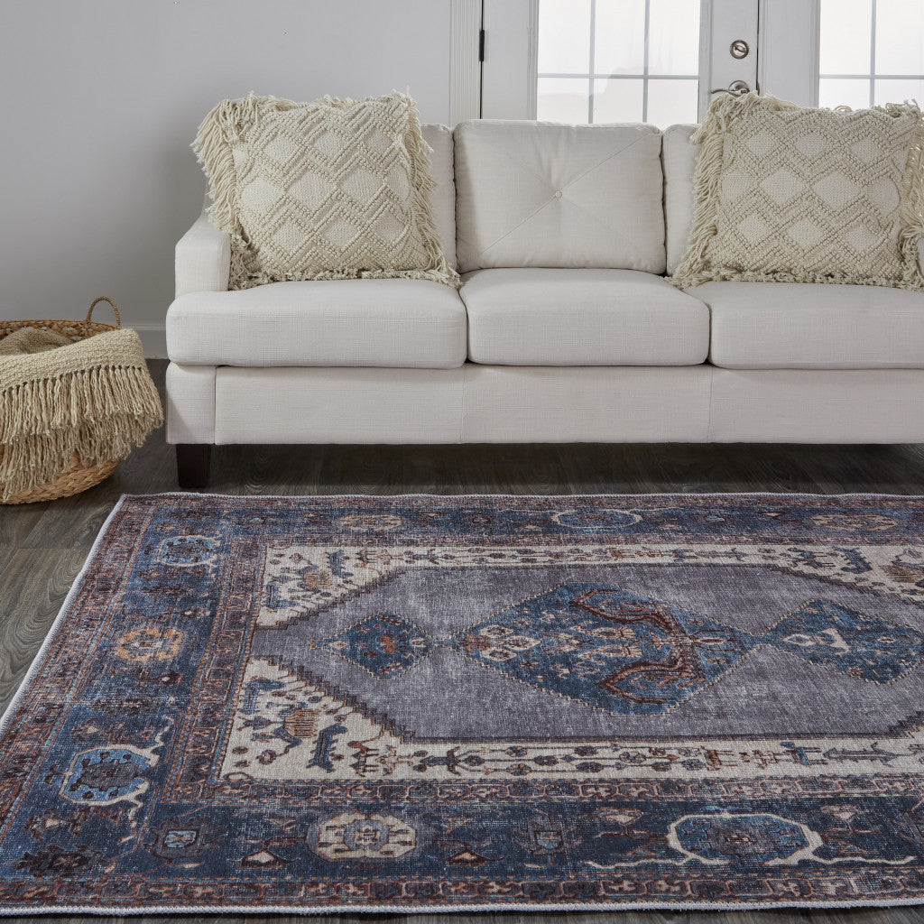 4' X 6' Blue Brown And Ivory Floral Area Rug