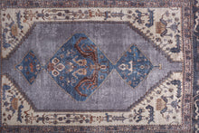 4' X 6' Blue Brown And Ivory Floral Area Rug