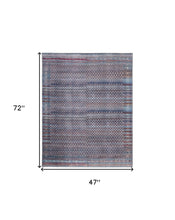 4' X 6' Tan Blue And Pink Striped Power Loom Area Rug