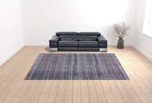 4' X 6' Tan Blue And Pink Striped Power Loom Area Rug