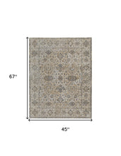 9' X 12' Ivory Tan And Gray Power Loom Area Rug