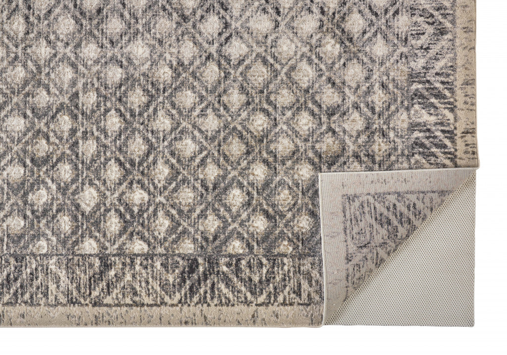 2' X 3' Ivory Black And Taupe Abstract Stain Resistant Area Rug