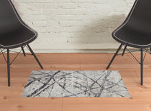 2' X 3' Taupe Gray And Ivory Abstract Stain Resistant Area Rug