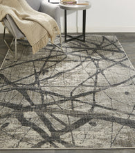 2' X 3' Taupe Gray And Ivory Abstract Stain Resistant Area Rug