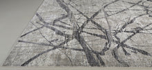 2' X 3' Taupe Gray And Ivory Abstract Stain Resistant Area Rug