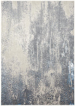 Gray Blue And Ivory Abstract Stain Resistant Area Rug - 2' x 3'