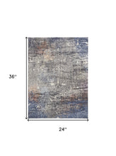 2' X 3' Taupe Blue And Ivory Abstract Power Loom Distressed Stain Resistant Area Rug