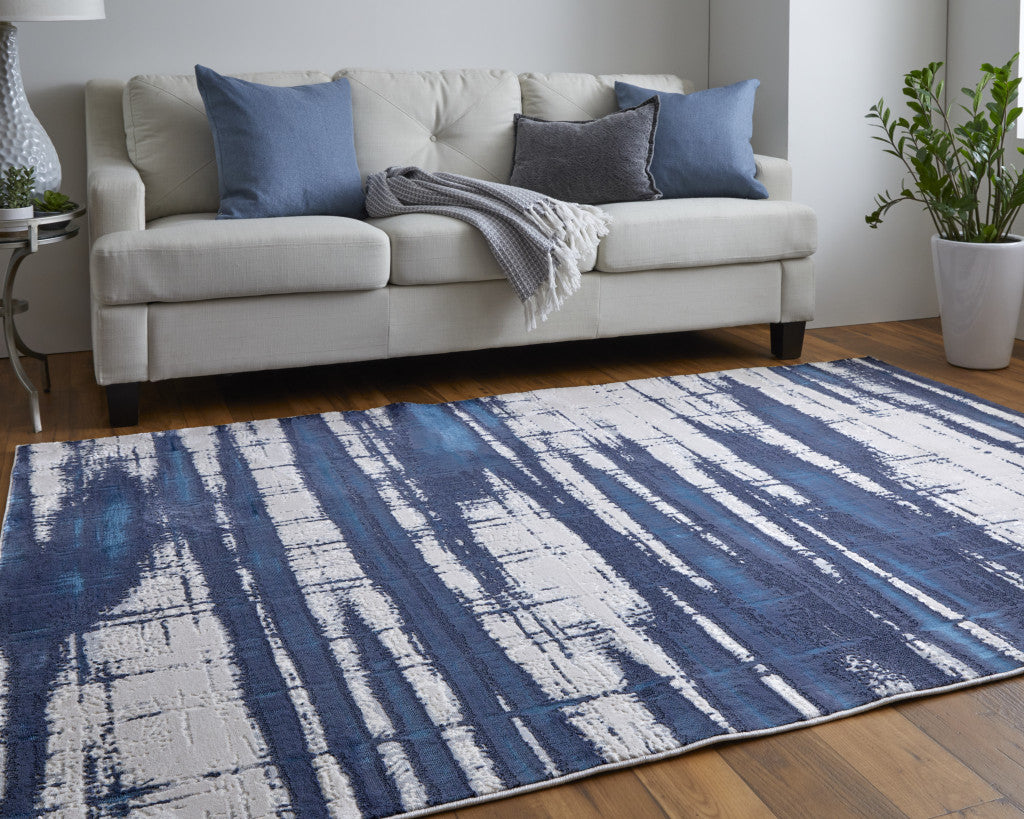 2' X 3' Ivory Blue And Gray Abstract Power Loom Distressed Area Rug