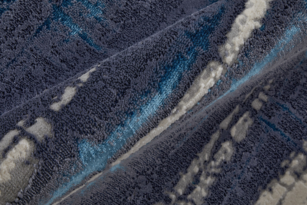 2' X 3' Ivory Blue And Gray Abstract Power Loom Distressed Area Rug