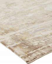 2' X 3' Tan Ivory And Gray Abstract Area Rug