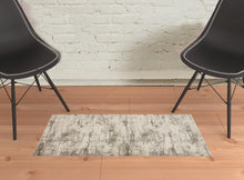 2' X 3' Ivory And Brown Abstract Area Rug