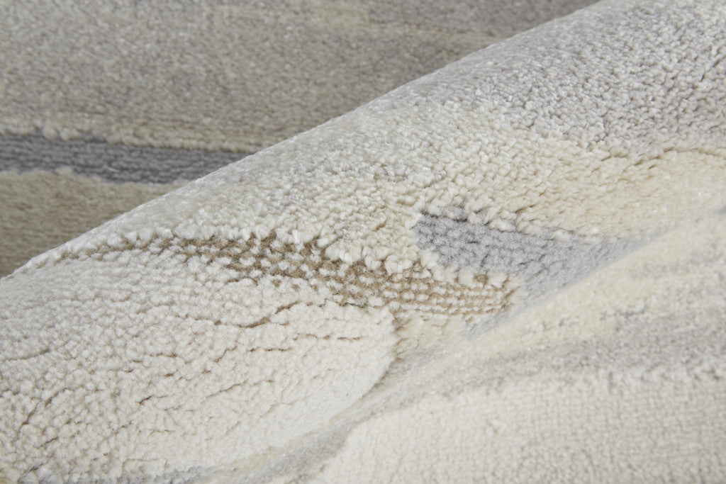 2' X 3' Ivory Tan And Brown Abstract Power Loom Distressed Stain Resistant Area Rug