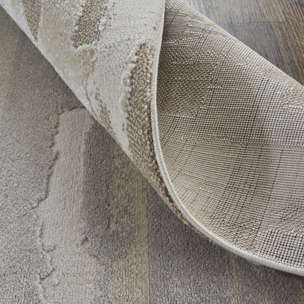 2' X 3' Ivory Tan And Brown Abstract Power Loom Distressed Stain Resistant Area Rug