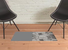 2' X 3' Ivory Brown And Gray Abstract Power Loom Stain Resistant Area Rug