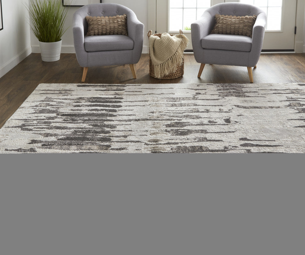 2' X 3' Ivory Brown And Gray Abstract Power Loom Stain Resistant Area Rug