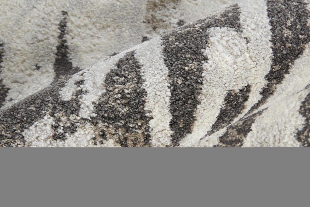 2' X 3' Ivory Brown And Gray Abstract Power Loom Stain Resistant Area Rug