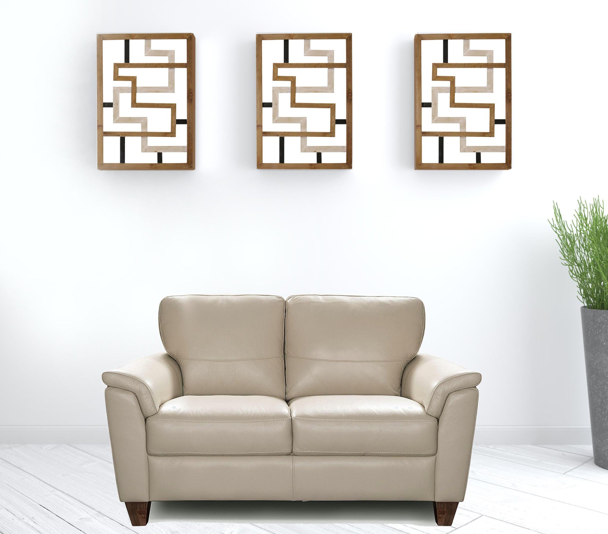 Beige Leather And Black Standard Love Seat 62"