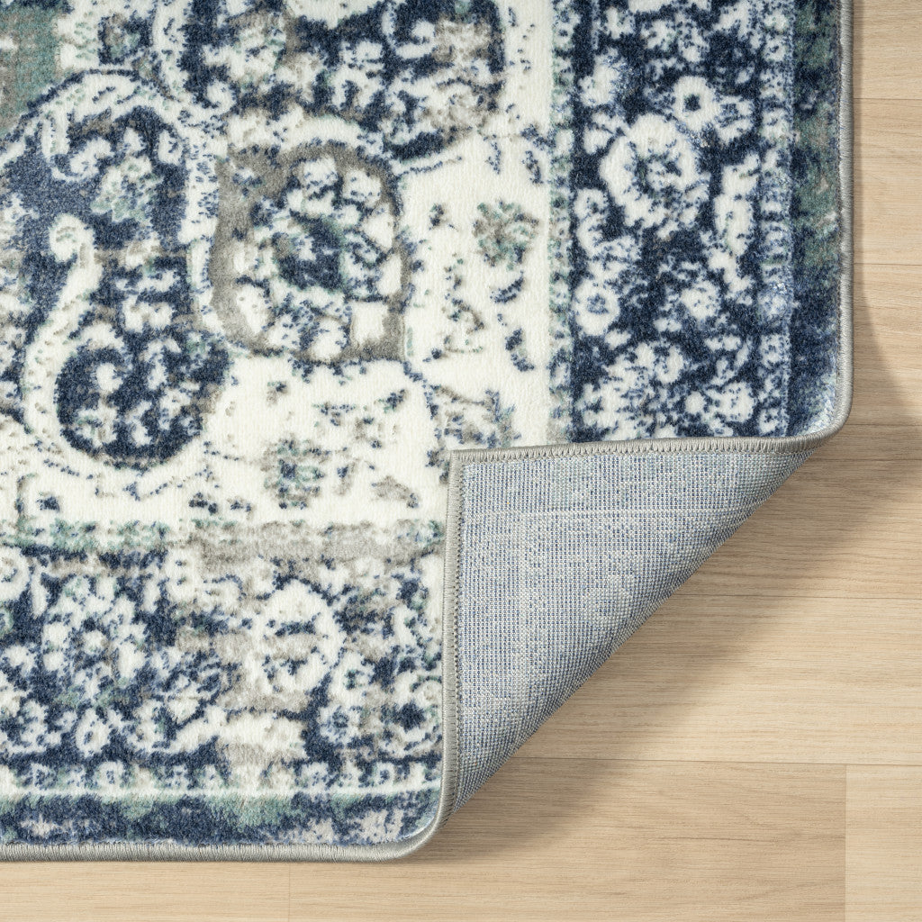 5' X 7' Blue Floral Stain Resistant Area Rug