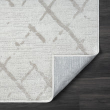 5' X 7' Cream Geometric Area Rug