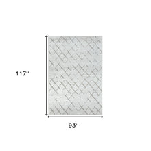 5' X 7' Cream Geometric Area Rug