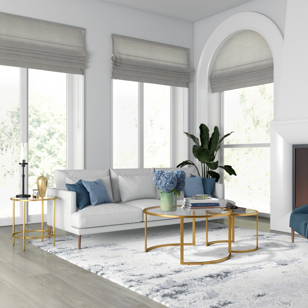 Set Of Two 36" Gold and Glass Round Nested Coffee Tables