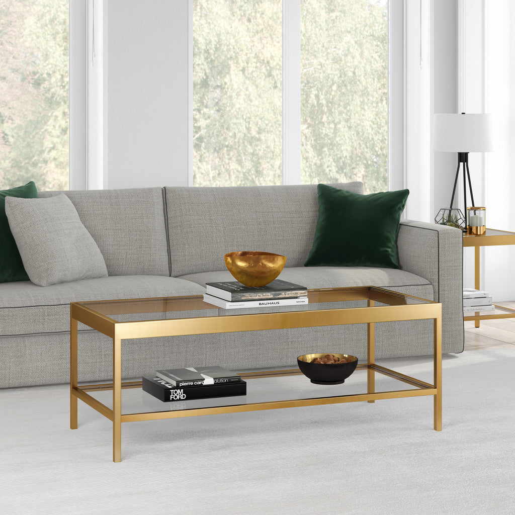 45" Gold and Glass Rectangular Coffee Table With Shelf
