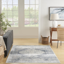 7' X 9' Blue Oriental Power Loom Distressed Washable Area Rug