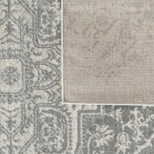 8'x10' Grey Machine Woven Distressed Floral Medallion Indoor Area Rug
